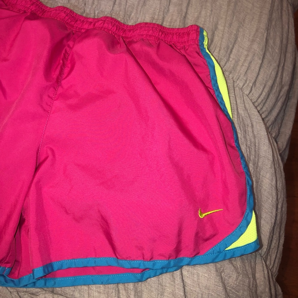 Neon pink nike athletic shorts
